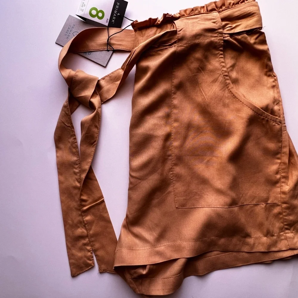 Dress shorts, yellow size 8 . PRIMARK CARES